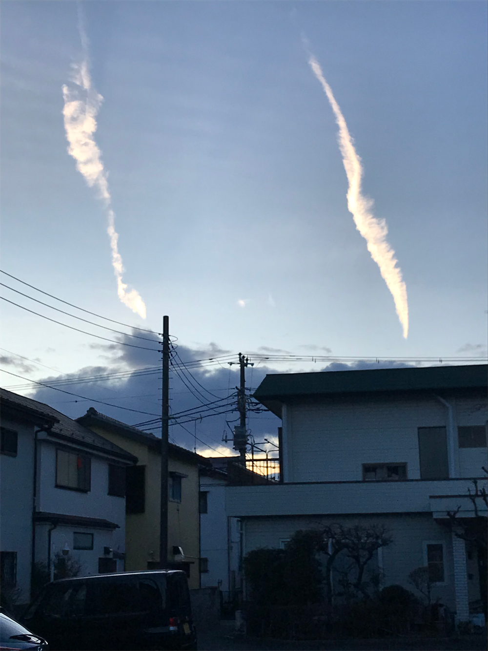 飛行機雲と雨